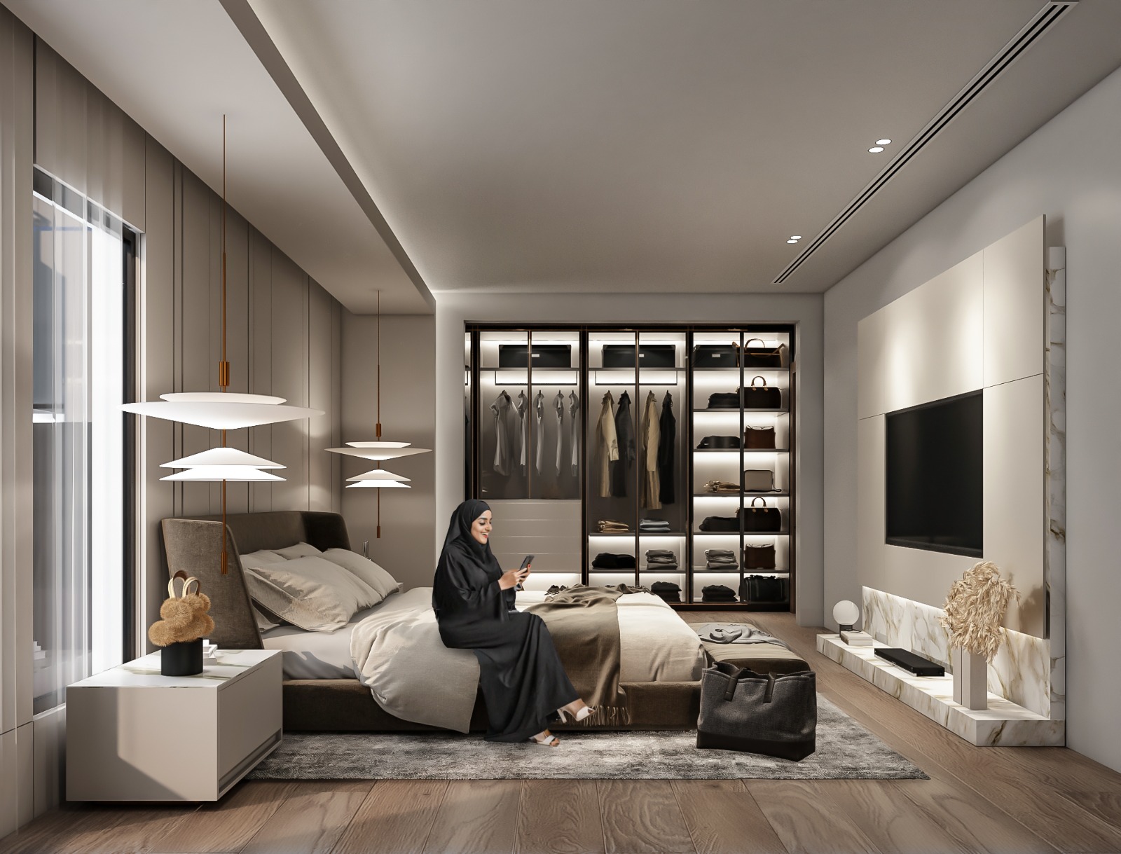 Bedroom with illuminated walk-in wardrobe display and marble TV wall